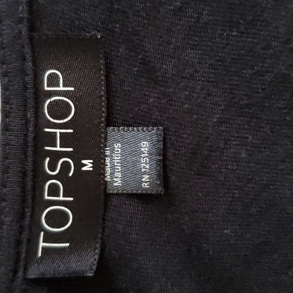 Like new, Romper black with ruffle and trim so cute split up the sides of short - Picture 6 of 7